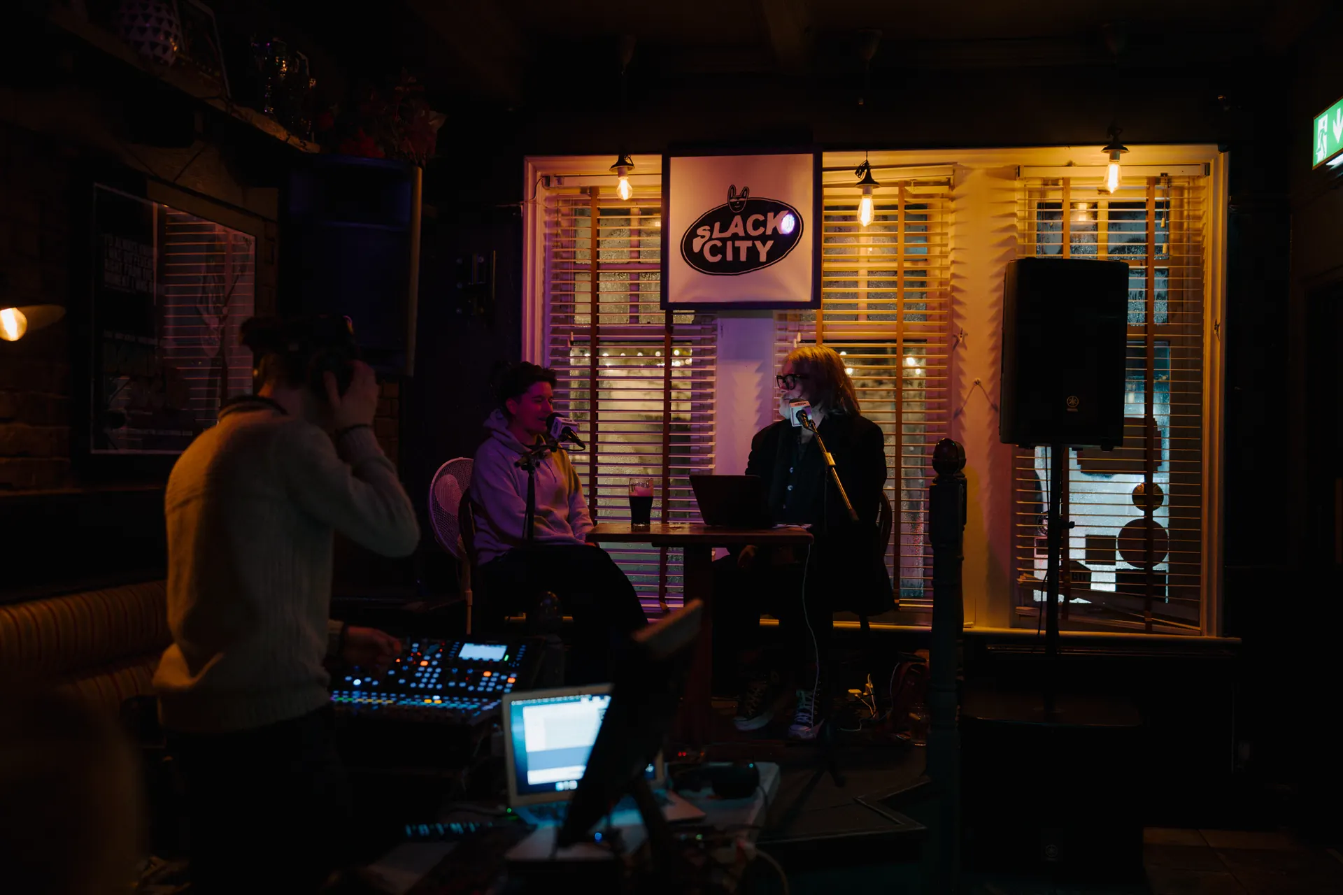 Luke Staniland at the mixing desk, engineering a live Slack City podcast at Band on the Wall, Manchester